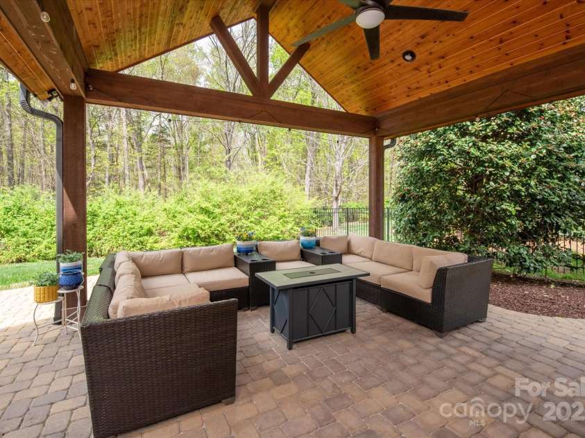 11308 Wheat Ridge Road, Charlotte, NC 28277.  MLS# CAR4241331, YatesRealty ID 4212. Covered porch w/ hand laid pavers makes outstanding entertaining space