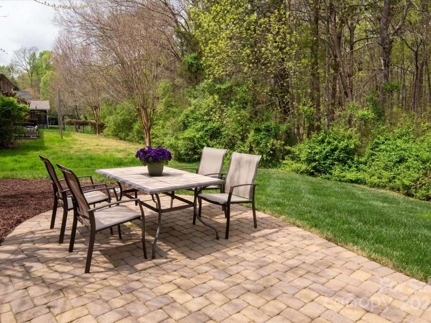 11308 Wheat Ridge Road, Charlotte, NC 28277.  MLS# CAR4241331, YatesRealty ID 4212. Expansive patio backs to private wooded area