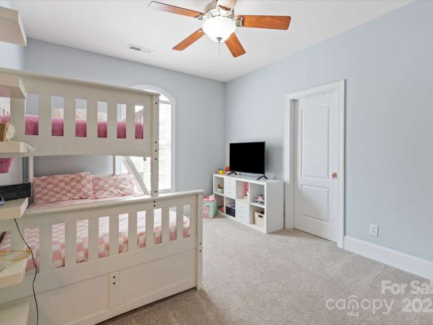 11308 Wheat Ridge Road, Charlotte, NC 28277.  MLS# CAR4241331, YatesRealty ID 4212. Secondary bedroom w/ custom walk-in closet and access to Jack and Jill bath