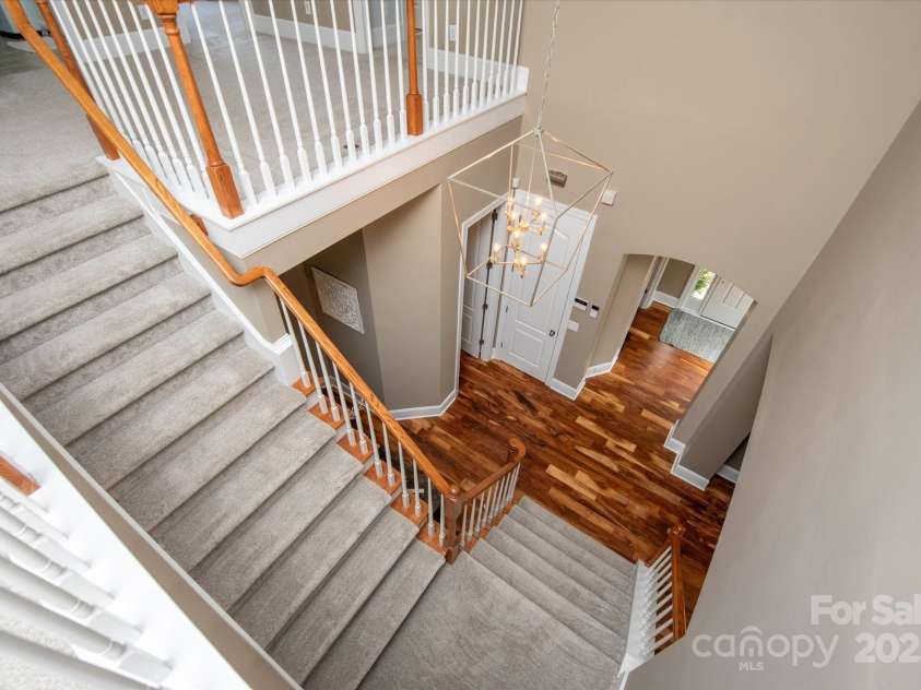 11308 Wheat Ridge Road, Charlotte, NC 28277.  MLS# CAR4241331, YatesRealty ID 4212. Soaring entry ceiling and updated foyer chandelier
