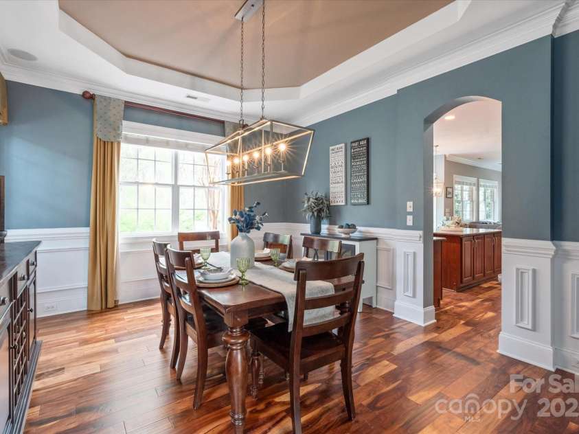11308 Wheat Ridge Road, Charlotte, NC 28277.  MLS# CAR4241331, YatesRealty ID 4212. Spacious formal dining room with modern lighting