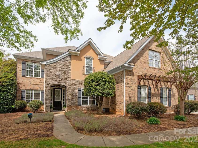 11308 Wheat Ridge Road, Charlotte, NC 28277.  MLS# CAR4241331, YatesRealty ID 4212. Stately brick, stone and stucco home