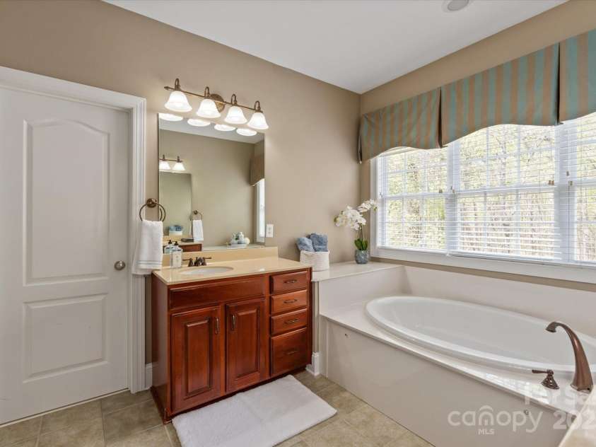 11308 Wheat Ridge Road, Charlotte, NC 28277.  MLS# CAR4241331, YatesRealty ID 4212. Two separate vanities and huge walk-in custom closet