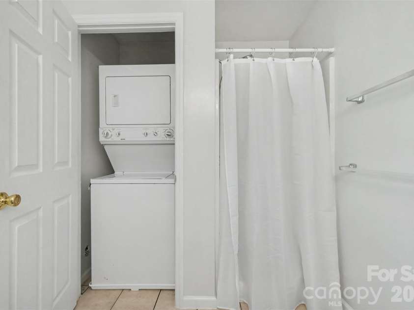 5315 Ruth Drive, Charlotte, NC 28215.  MLS# CAR4407741, YatesRealty ID 42129. Converted, finished structure: full bathroom stackable washer/driver and shower