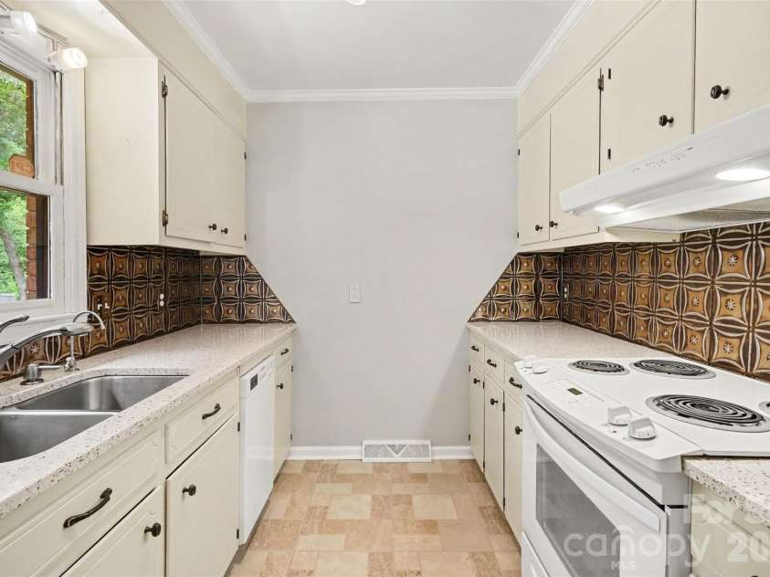 5315 Ruth Drive, Charlotte, NC 28215.  MLS# CAR4407741, YatesRealty ID 42129. Main house: Refreshed kitchen