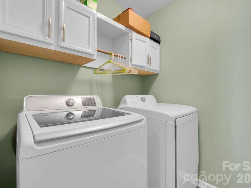 15039 Ockeechobee Court, Mint Hill, NC 28227.  MLS# CAR4354276, YatesRealty ID 4213. Separate laundry area with storage