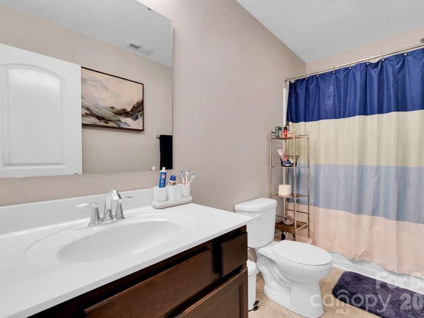 15039 Ockeechobee Court, Mint Hill, NC 28227.  MLS# CAR4354276, YatesRealty ID 4213. Upper level bathroom
