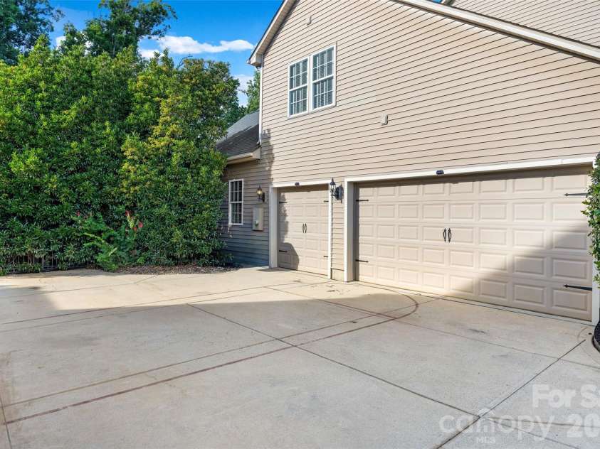 233 Squirrel Lane, Clover, SC 29710.  MLS# CAR4394508, YatesRealty ID 42132. Oversized driveway and three-car garage
