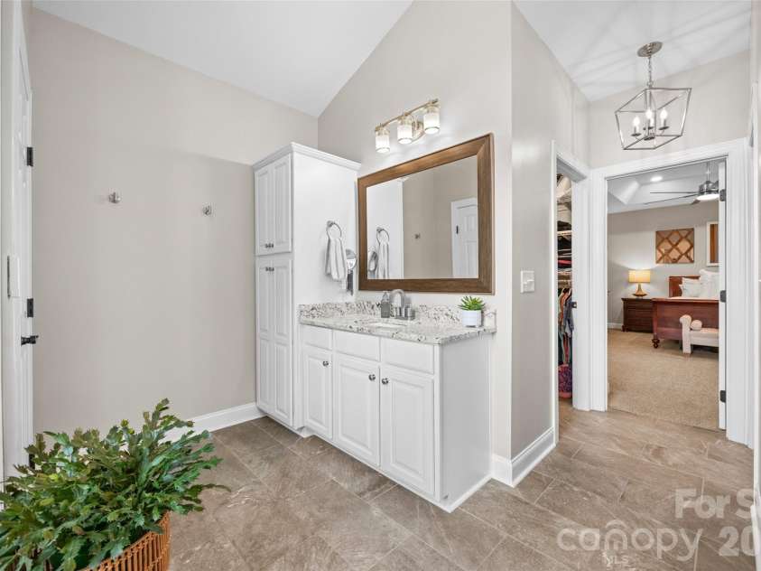 233 Squirrel Lane, Clover, SC 29710.  MLS# CAR4394508, YatesRealty ID 42132. Recently remodeled primary bath with separate vanities and heated floors