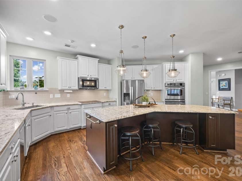 233 Squirrel Lane, Clover, SC 29710.  MLS# CAR4394508, YatesRealty ID 42132. Spacious, bright kitchen with double ovens and large island