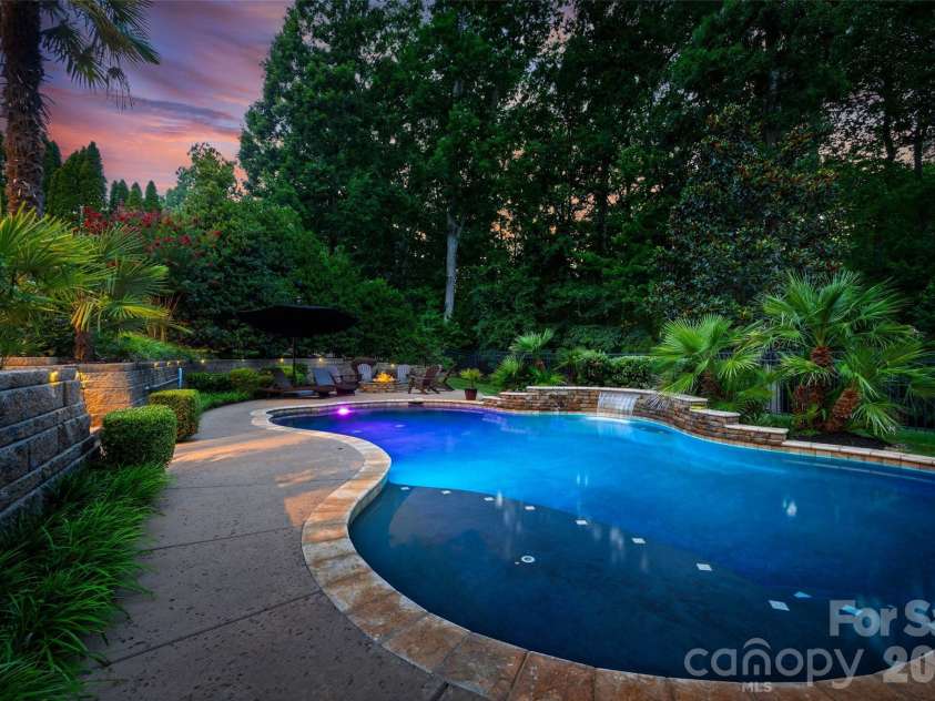 233 Squirrel Lane, Clover, SC 29710.  MLS# CAR4394508, YatesRealty ID 42132. Stunning saltwater pool with waterfall feature