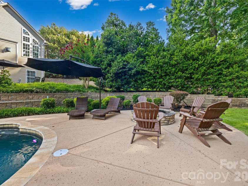 233 Squirrel Lane, Clover, SC 29710.  MLS# CAR4394508, YatesRealty ID 42132. Sun-deck off salt-water pool