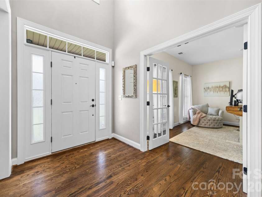 233 Squirrel Lane, Clover, SC 29710.  MLS# CAR4394508, YatesRealty ID 42132. Two-story foyer with solid hardwood flooring