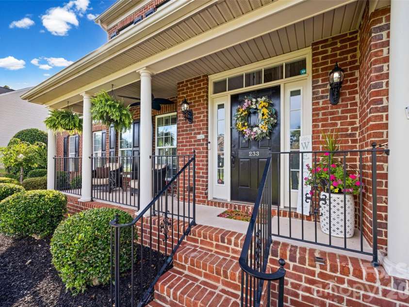 233 Squirrel Lane, Clover, SC 29710.  MLS# CAR4394508, YatesRealty ID 42132. Welcoming front porch