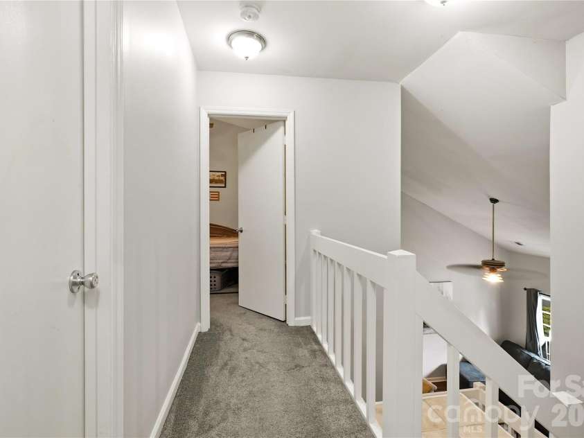 6355 Windsor Gate Lane, Charlotte, NC 28215.  MLS# CAR4406081, YatesRealty ID 42134. Hallway leading to additional bedrooms