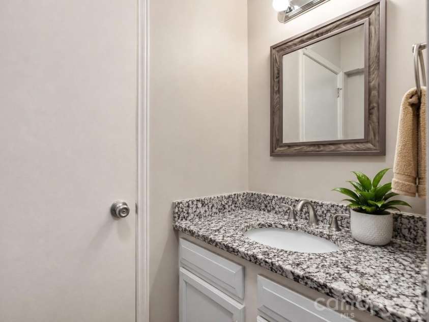 6355 Windsor Gate Lane, Charlotte, NC 28215.  MLS# CAR4406081, YatesRealty ID 42134. Updated secondary bathroom