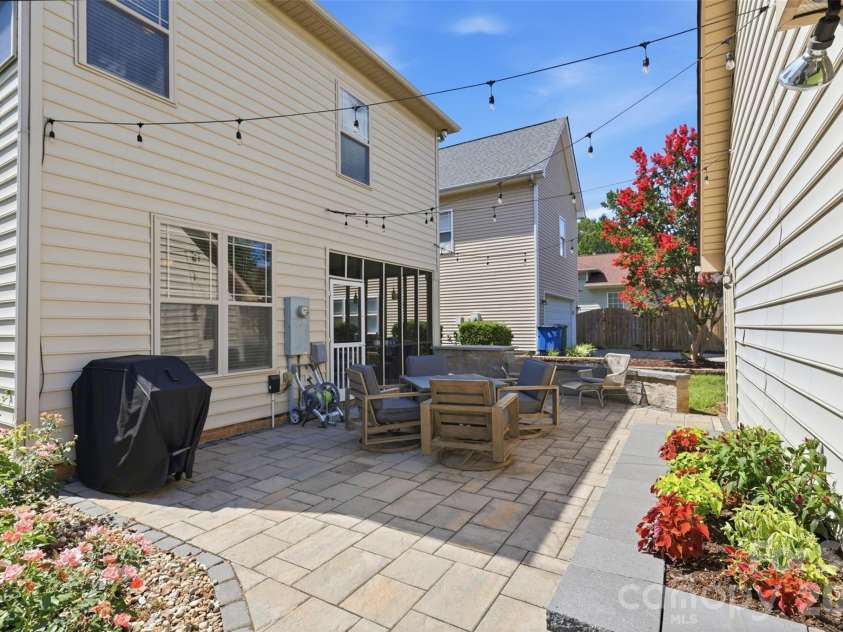 4140 Cedar Point Avenue, Matthews, NC 28104.  MLS# CAR4400390, YatesRealty ID 42135. Back Patio