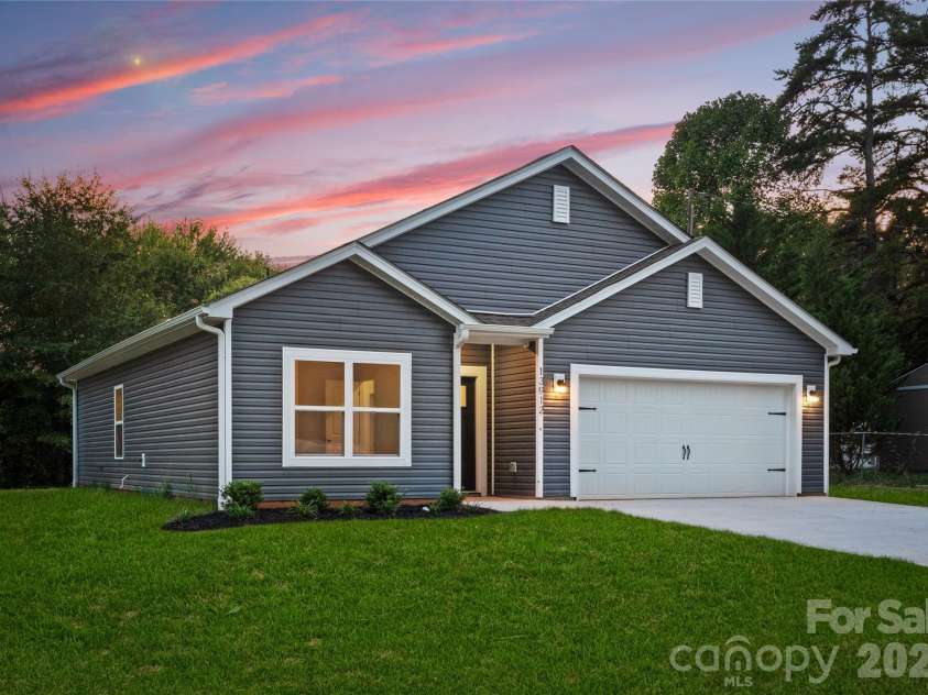 5230 Hickory Lane, Charlotte, NC 28216.  MLS# CAR4404210, YatesRealty ID 42143. Representative, subject to change