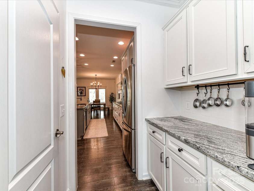15724 Reynolds Drive, Indian Land, SC 29707.  MLS# CAR4235677, YatesRealty ID 4215. Butler's Pantry and walkin Pantry