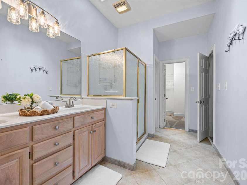 5385 Apple Glen Drive, Harrisburg, NC 28075.  MLS# CAR4407413, YatesRealty ID 42152. DOUBLE VANITY IN PRIMARY BATHROOM