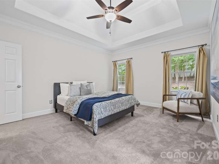 5385 Apple Glen Drive, Harrisburg, NC 28075.  MLS# CAR4407413, YatesRealty ID 42152. PRIMARY BEDROOM WITH TRAY CEILING