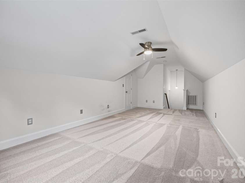 5385 Apple Glen Drive, Harrisburg, NC 28075.  MLS# CAR4407413, YatesRealty ID 42152. ROOM OVER GARAGE