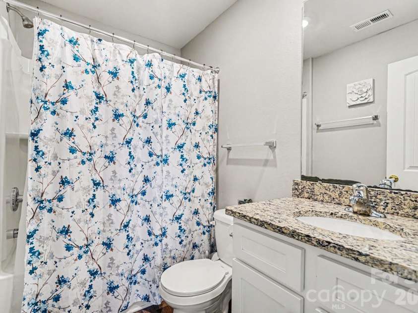 2238 Lanza Drive, Charlotte, NC 28215.  MLS# CAR4403763, YatesRealty ID 42163. Hall bathroom with granite countertops