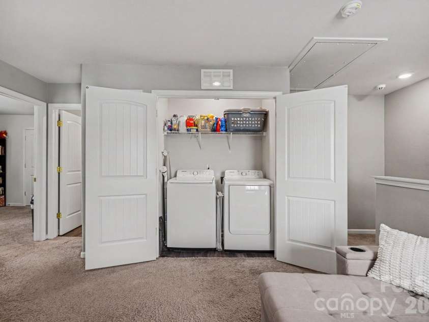 2238 Lanza Drive, Charlotte, NC 28215.  MLS# CAR4403763, YatesRealty ID 42163. Laundry room is off the loft area,