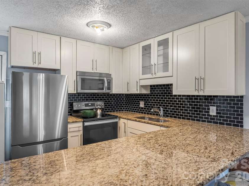 119 Colony Drive, Arden, NC 28704.  MLS# CAR4408014, YatesRealty ID 42177. 