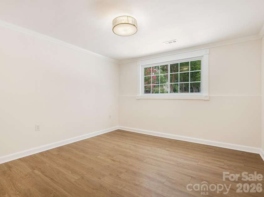 5808 Ryder Avenue, Charlotte, NC 28226.  MLS# CAR4411559, YatesRealty ID 42178. Lower level Bedroom 3