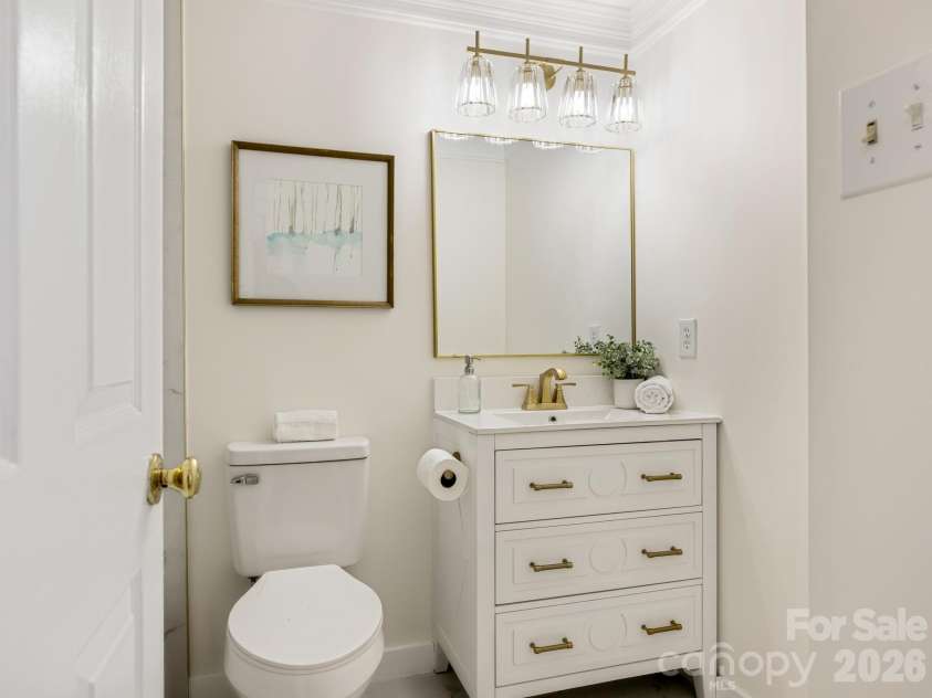5808 Ryder Avenue, Charlotte, NC 28226.  MLS# CAR4411559, YatesRealty ID 42178. Main level hall bath