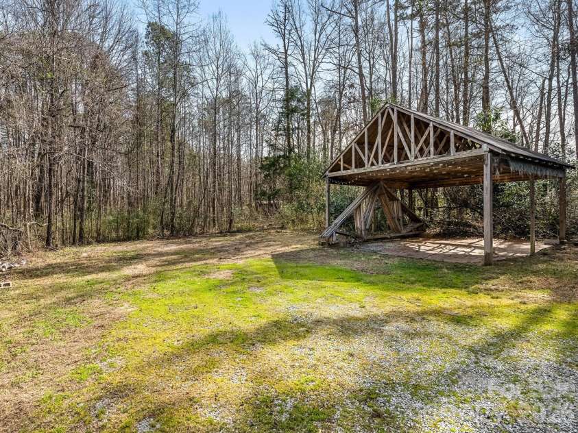2346 Sam Newell Road, Matthews, NC 28105.  MLS# CAR4353522, YatesRealty ID 4218. Carport