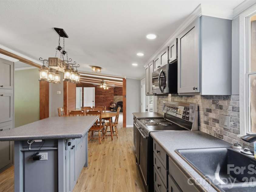 8162 Nc 16 Highway, Moravian Falls, NC 28654.  MLS# CAR4410384, YatesRealty ID 42188. Another kitchen view