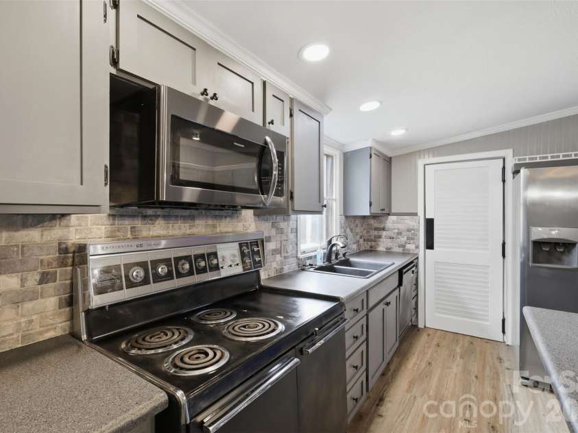 8162 Nc 16 Highway, Moravian Falls, NC 28654.  MLS# CAR4410384, YatesRealty ID 42188. Kitchen view 2