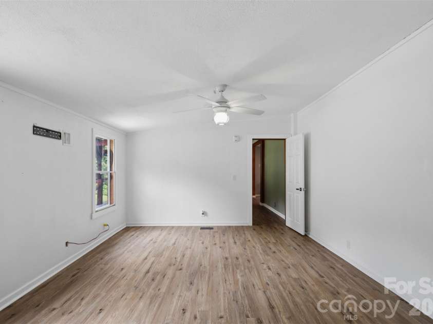 8162 Nc 16 Highway, Moravian Falls, NC 28654.  MLS# CAR4410384, YatesRealty ID 42188. Primary suite view 2