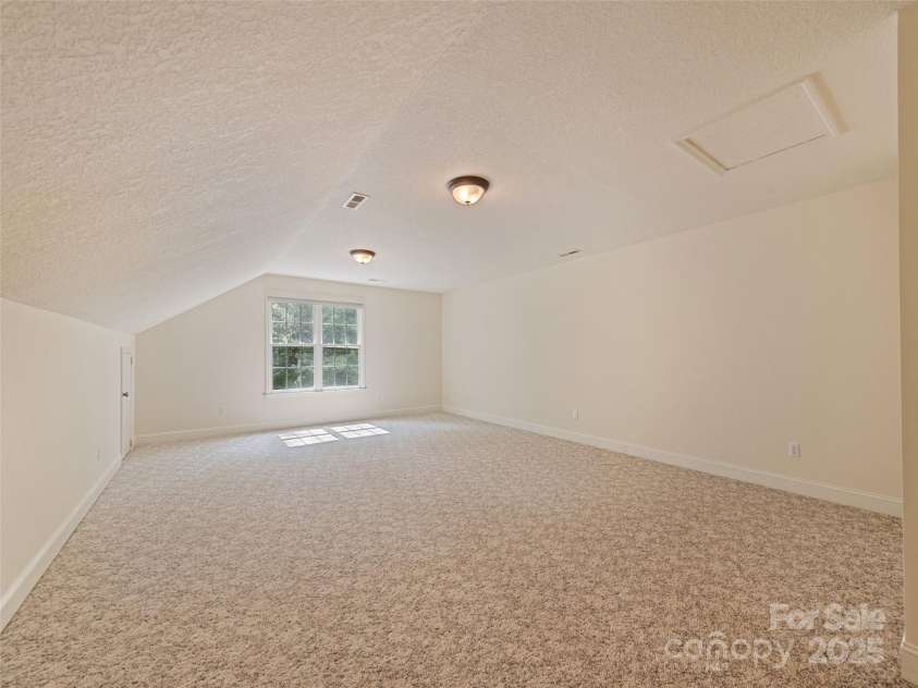 6 Dogwood Lane, Fletcher, NC 28732.  MLS# CAR4302762, YatesRealty ID 4219. Finished Room Over Garage. Perfect for Kids Play Area, Home Office, Guest Quarters ETC...