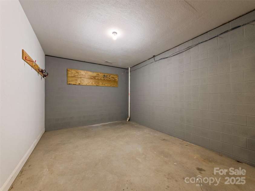 6 Dogwood Lane, Fletcher, NC 28732.  MLS# CAR4302762, YatesRealty ID 4219. Storage Area In Basement