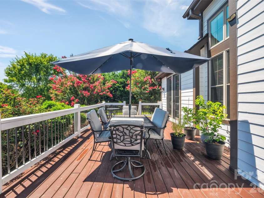 37 Carland Drive, Arden, NC 28704.  MLS# CAR4409376, YatesRealty ID 42190. Back Porch Left
