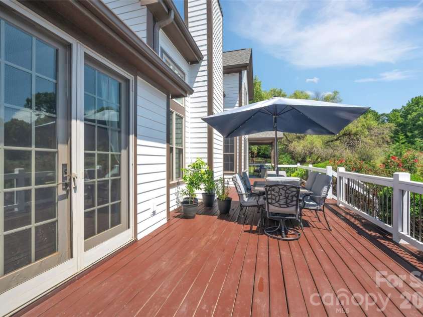 37 Carland Drive, Arden, NC 28704.  MLS# CAR4409376, YatesRealty ID 42190. Back Porch Right