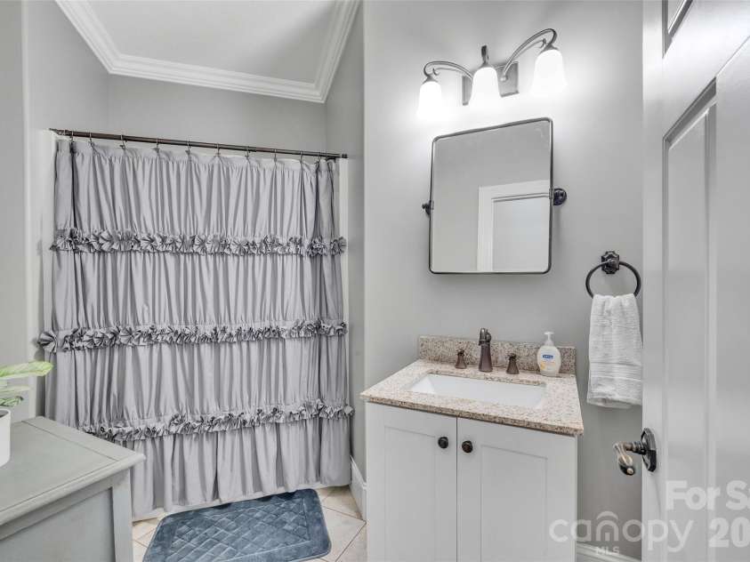 37 Carland Drive, Arden, NC 28704.  MLS# CAR4409376, YatesRealty ID 42190. Guest Bathroom - Main Floor