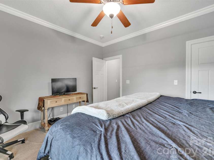 37 Carland Drive, Arden, NC 28704.  MLS# CAR4409376, YatesRealty ID 42190. Guest Bedroom - Main Floor