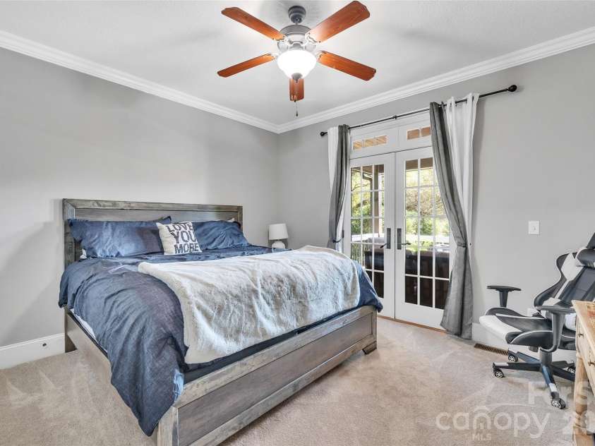 37 Carland Drive, Arden, NC 28704.  MLS# CAR4409376, YatesRealty ID 42190. Guest Bedroom - Main Floor