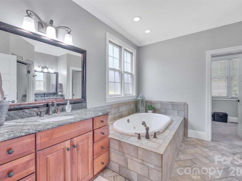 37 Carland Drive, Arden, NC 28704.  MLS# CAR4409376, YatesRealty ID 42190. Master Bathroom