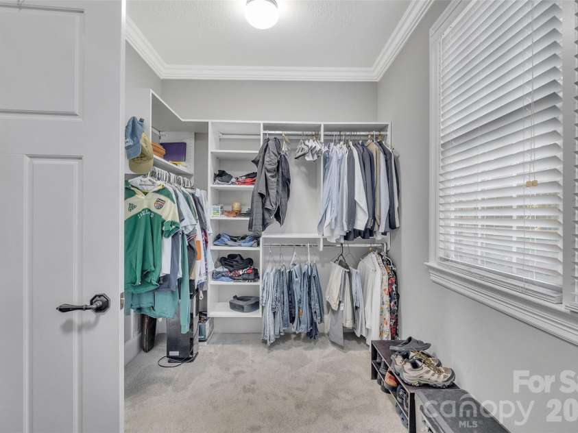 37 Carland Drive, Arden, NC 28704.  MLS# CAR4409376, YatesRealty ID 42190. Master Closet - Left Side