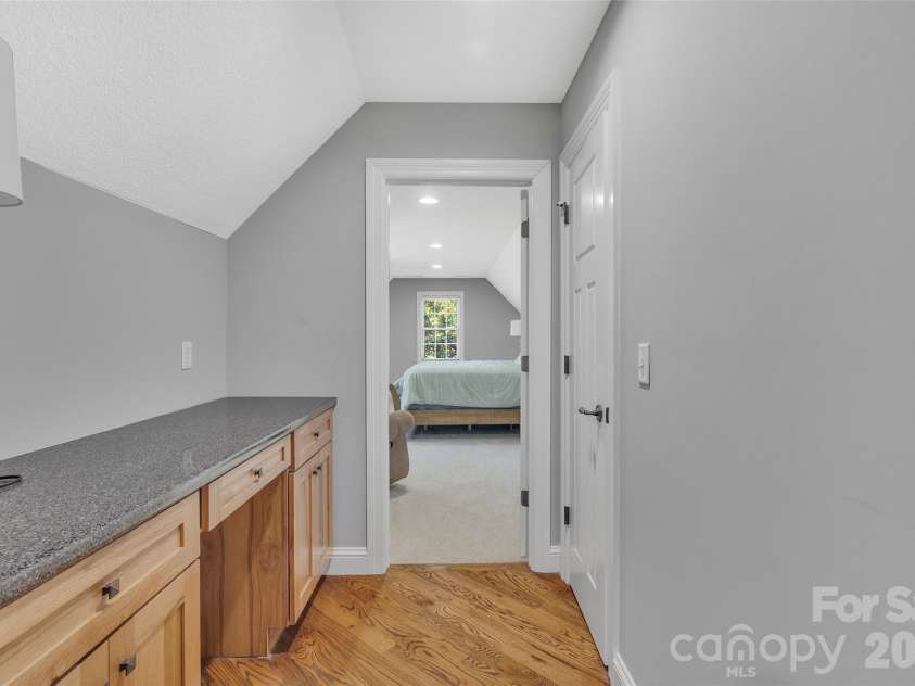 37 Carland Drive, Arden, NC 28704.  MLS# CAR4409376, YatesRealty ID 42190. Upstairs Hallway Desk
