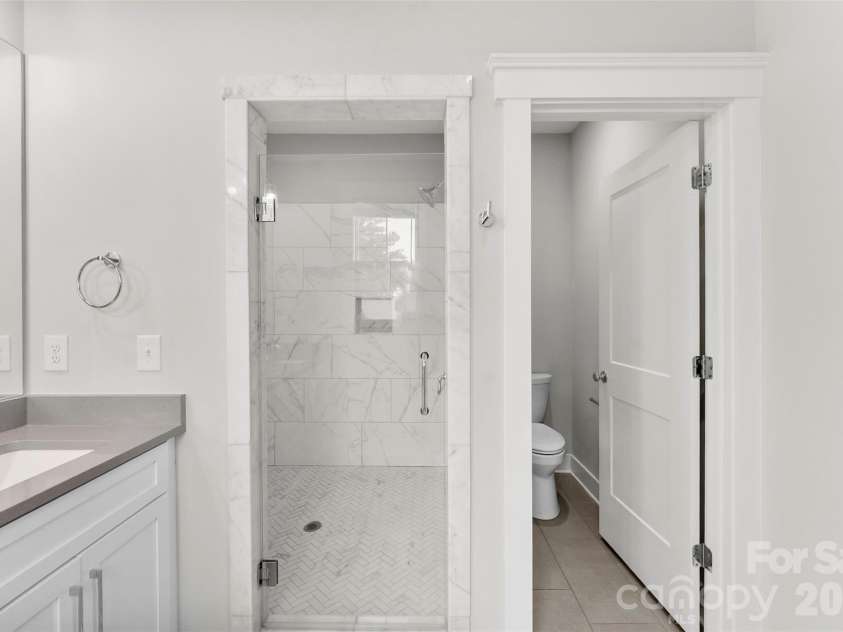 543 Greystone Road, Charlotte, NC 28209.  MLS# CAR4405427, YatesRealty ID 42193. Large shower and separate water closet