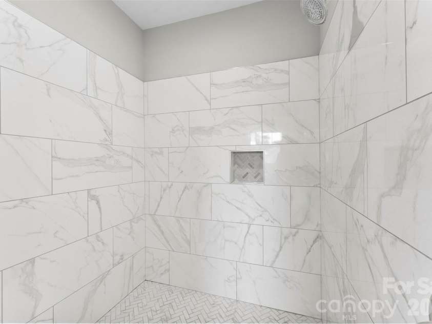 543 Greystone Road, Charlotte, NC 28209.  MLS# CAR4405427, YatesRealty ID 42193. Oversized custom tile shower