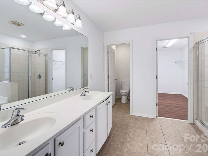 5226 Coffeeberry Lane, Charlotte, NC 28227.  MLS# CAR4401255, YatesRealty ID 42196. Primary Bathroom