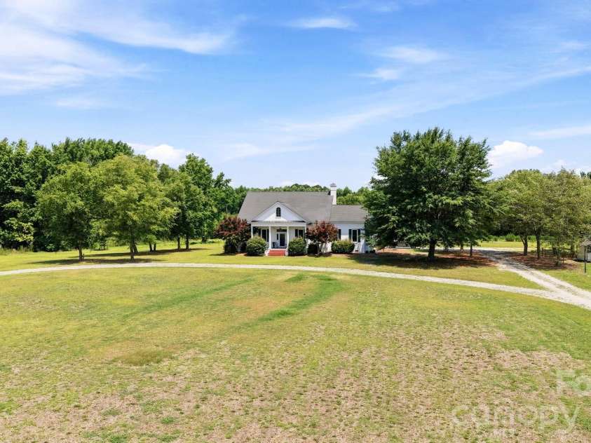 1004 Four Mile Loop, Cheraw, SC 29520.  MLS# CAR4332573, YatesRealty ID 4220. Beautifully Appointed Custom Home on 13.7 Acres