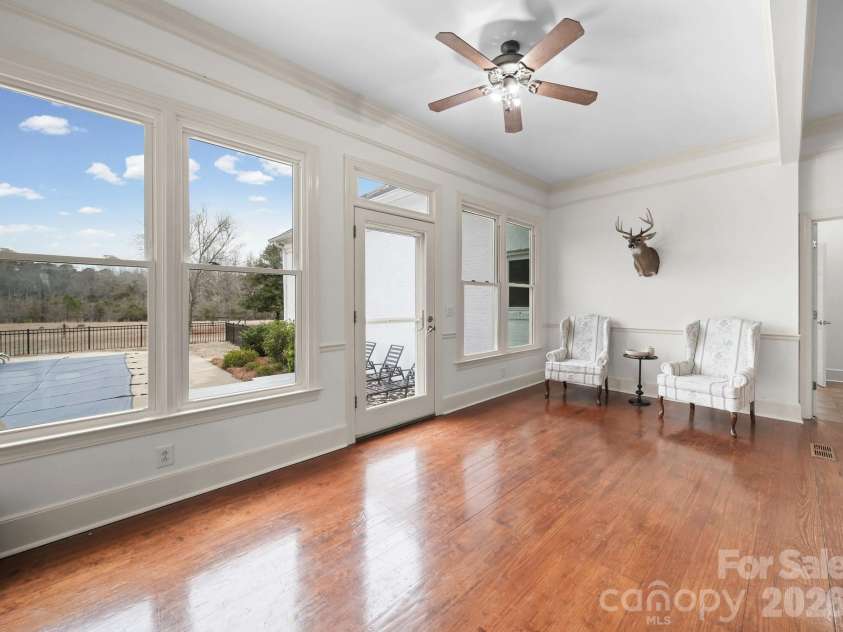 1004 Four Mile Loop, Cheraw, SC 29520.  MLS# CAR4332573, YatesRealty ID 4220. Living Room looking out to Inground Pool in Backyard